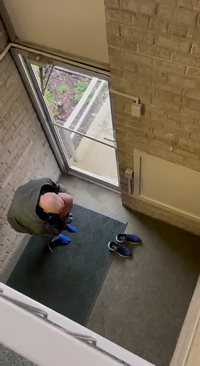 Stripping and masturbating in the hallway in the middle of the day.