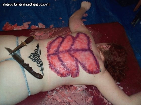 hmm... no kink category? a wax backplate I got done at a play party.