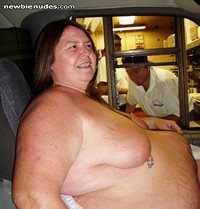 Naked at the drive thru just across the street from where I lived.  Boy wer...