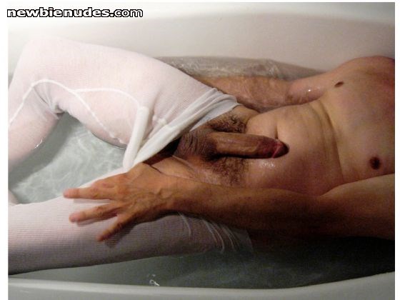 Rising tides expose uprooted tree