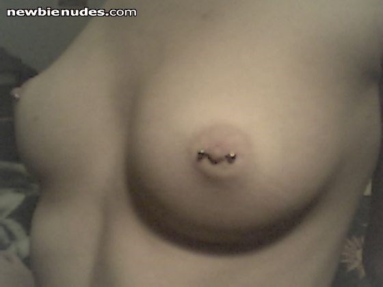 Beautiful pierced nipples!  Who wants to suck them?