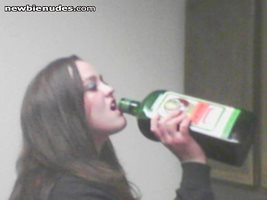 My girl goofing around with the booze :-P