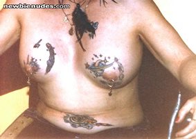 Angel tattoos & piercings