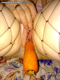 Gf using her silver bullet on her clit, look how wet she's made the carrot....