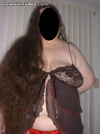 My wife, facing the camera, showing off her long hair.  Sorry for blacking ...