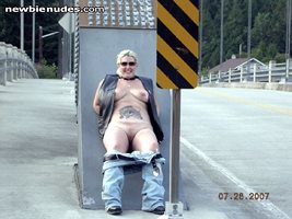 Slave stripping and posing by the side of the road one day while we were ri...