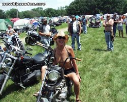 a friendly lady on a bike  2008 Iowa rally nothing better then hot flesh on...