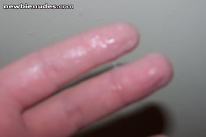 My wet fingers out of my plump pussy.
