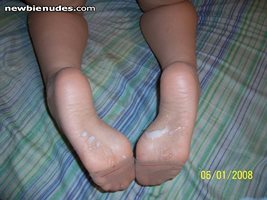 Shirley's creamed feet after being used as a foot-pussy.