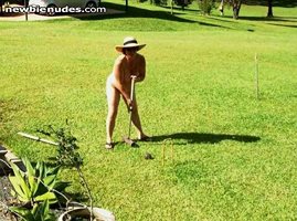 Playing croquet at a nude gathering