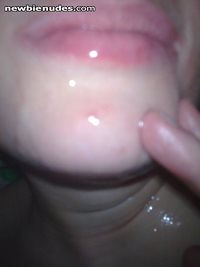 My dirty slut took a good amount of cum over her lips and chin!