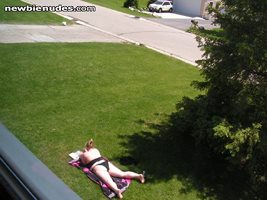 wife outside sunning herself