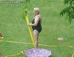 Here are some pictures of me in my one piece playing in the yard. I think t...