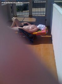 Sunbathing topless. You like?