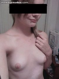 my slut's little tits. i love to cum all over them and then lick it up