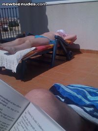 Sunbathing topless..u like?