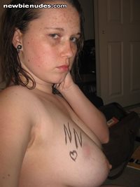 NN written on my big breast
