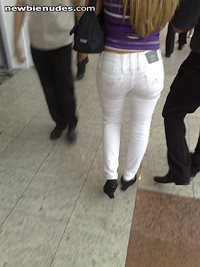 Wearing g-string at the mall under a tigh jeans. What a delicious ass this ...