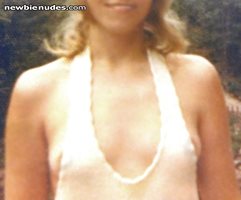 Married exhibitionist chick popping some nips in a skimy loose white halter...