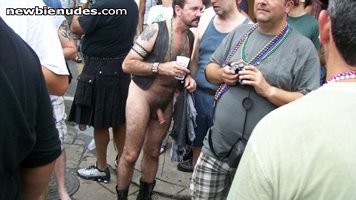 Nude and talking to the crowds during mardi Gras