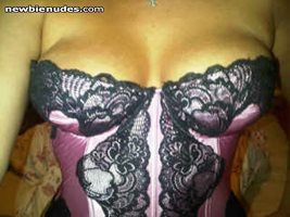 Girlfriend showing off in a sexy corset