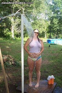 This is the wife Taking a shower outside this summer