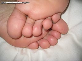 She has the softest toes!  Please vote or comment..she loves them