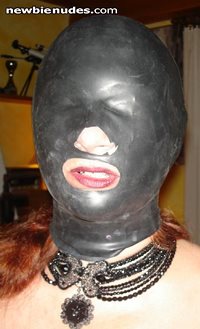 Hooded slave ready for suck your cock