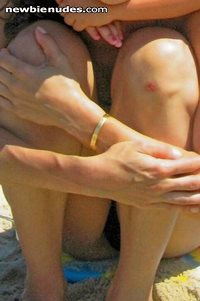 on the beach in a thong close up.....