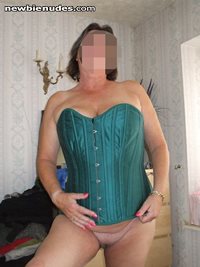 My green corset... I love to tease whilst wearing it..