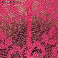 extreme closeup of bush through pink lace panties
