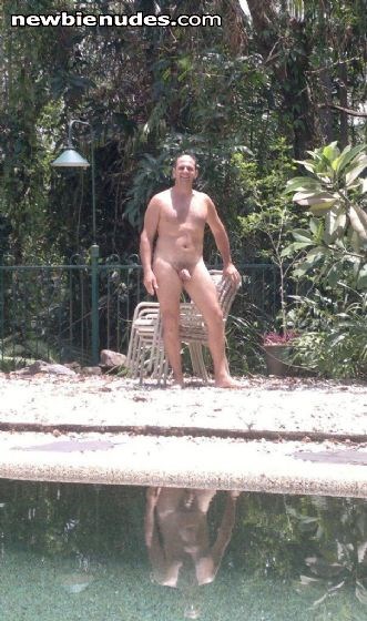 Posing across the pool