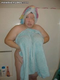 Being shy again. Trying to get her to drop the towel.