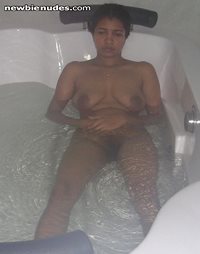 Long awaited pic of my wife alone so here's My wifey In the bath tub.   Do ...