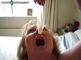 my condom full of cum,she just about too swallow the lot.