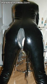who wants to cum over my wife in her pvc catsuit?