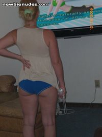 wife doing working out on the wii fitness