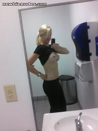 MILF Wife...taking self pics while on vacation, in a public restrooms...com...