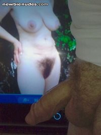 Masturbating looking at a very sexy lady with a sexy hairy vagina! So hot!