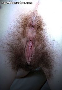 just hubby taking a pic of my hairy pussy