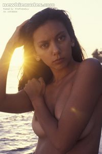 Lynn, "Miss Hawaii 1995", poses on a beach outside Honolulu in 1994.(Would ...
