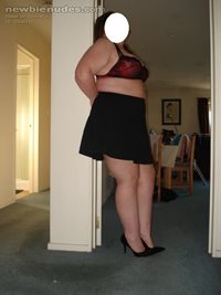 Short new skirt, new lingerie and stilettos.