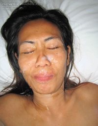 Lek, skinny Thai hottie gets my full load over her face....