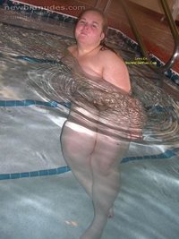 Swimming nude in a motel pool.