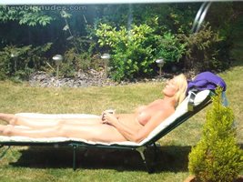 Naked sunbathing - so glad the sun is here - so are my neighbours!