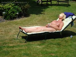 Naked sunbathing (plus I love flashing to my neighbours)