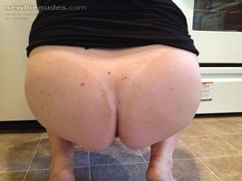 Me squatting with my thong tan line... Do you like tan lines?