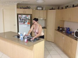 In the kitchen topless. Just how I like her