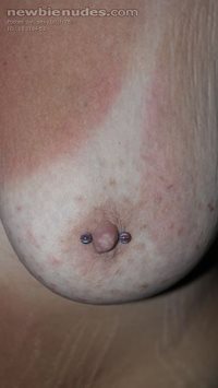 My pierced nipple and tan lines...