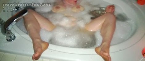 Wife having fun in a bubble bath.  Leave comments let her know what you thi...
